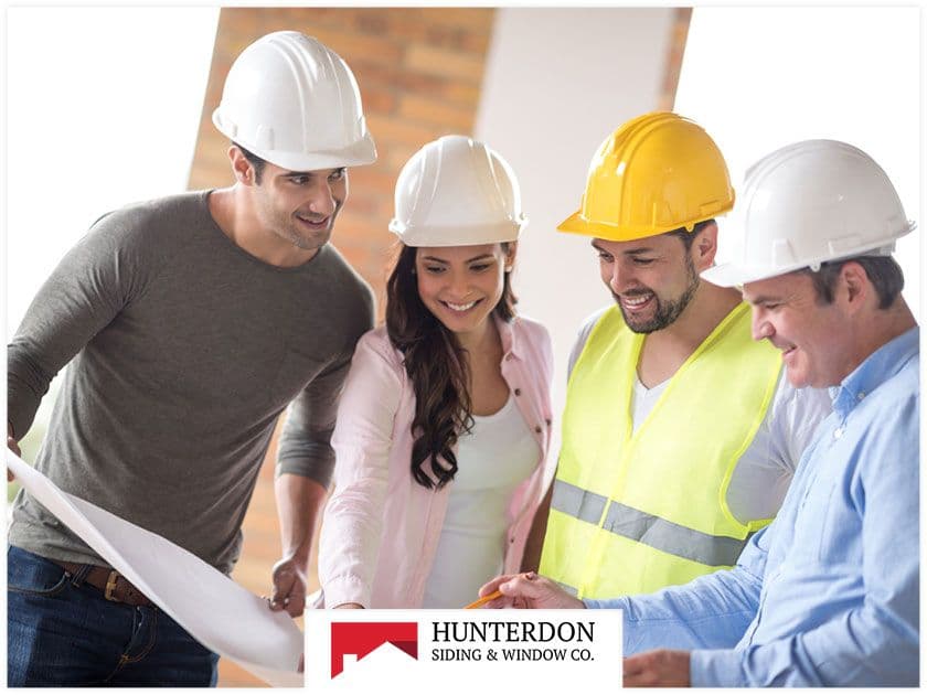 a-couple-of-people-in-hard-hats